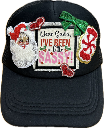 Sassy Santa Patches on a Black Trucker Cap